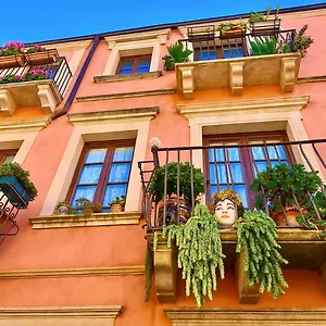 https://caterinas-charme-apartment.taorminaitalyhotels.com